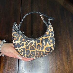 Forever 21 leopard print crossbody mini bag.
